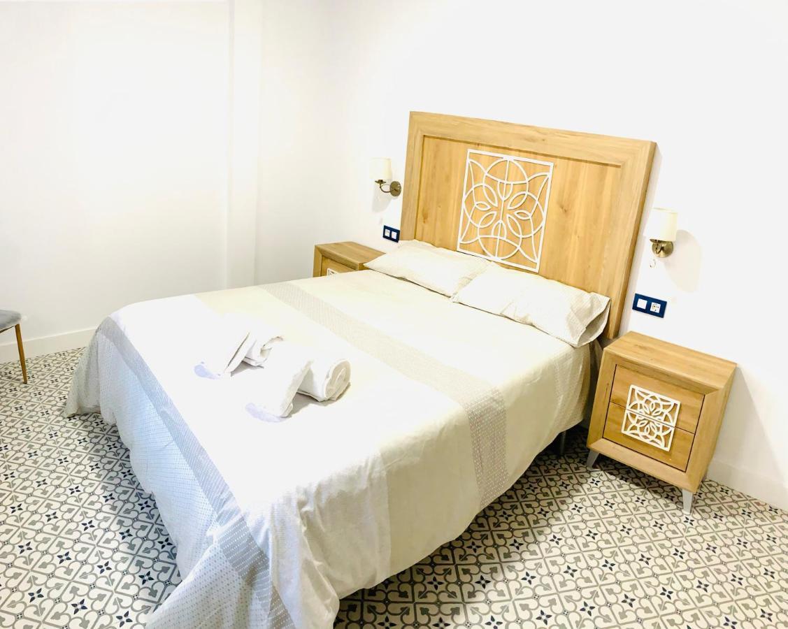 Al-Qazeres Suites Касерес Экстерьер фото