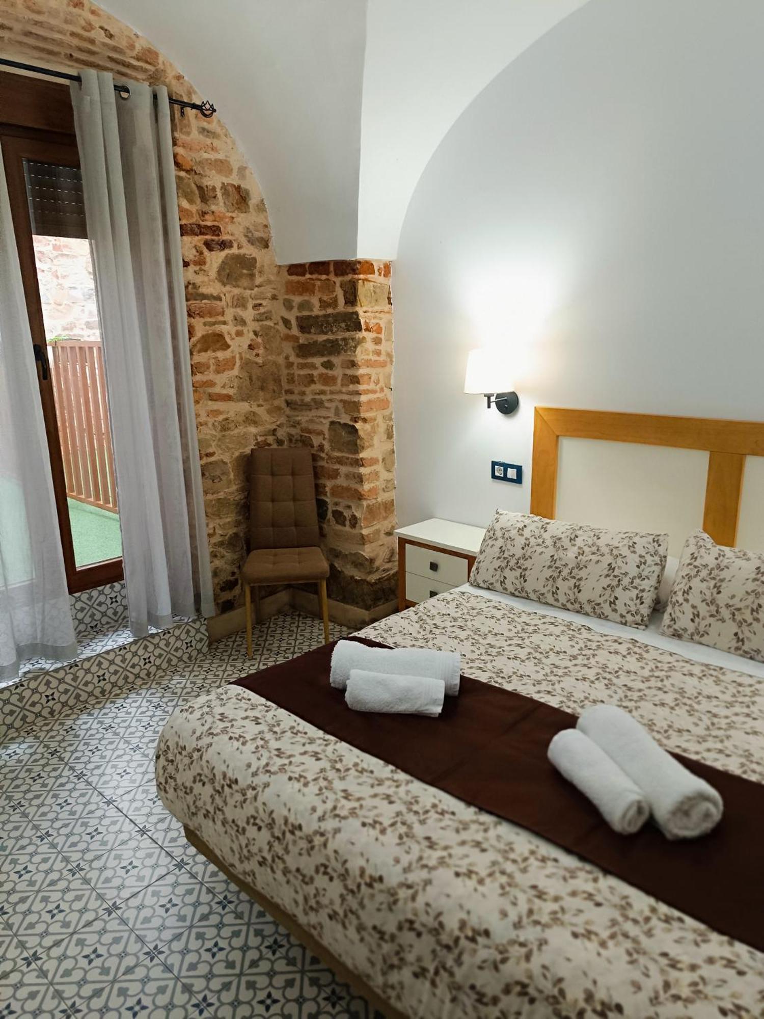Al-Qazeres Suites Касерес Экстерьер фото
