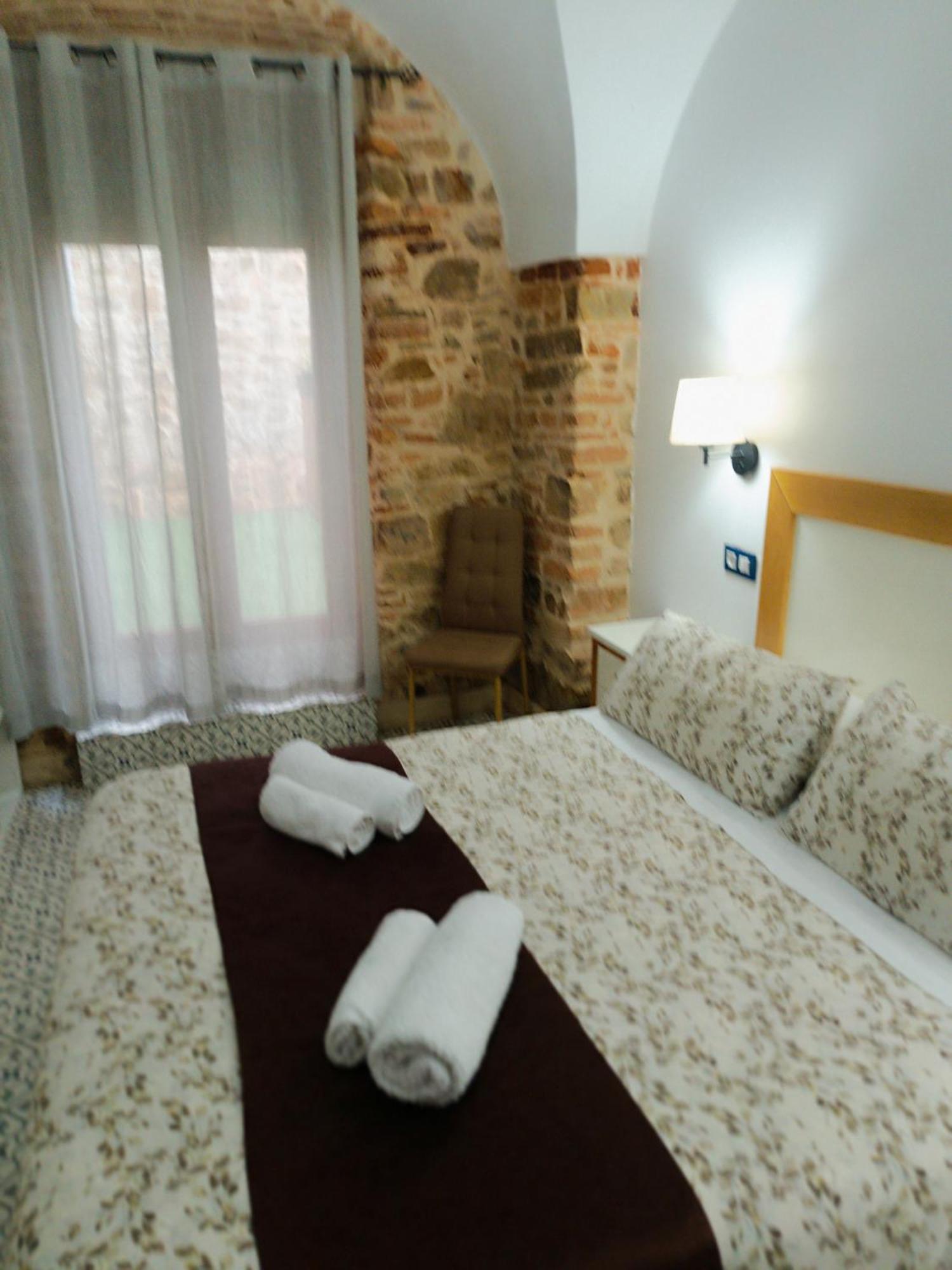 Al-Qazeres Suites Касерес Экстерьер фото
